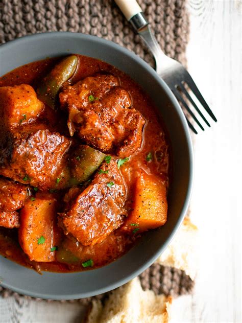 pork-in-tomato-sauce-with-potatoes-and-peppers image