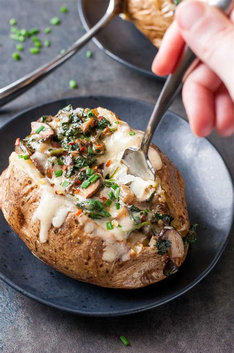 cheesy-vegetarian-loaded-baked-potatoes-with-spinach image
