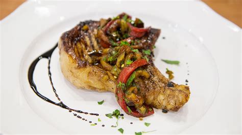 bobby-flays-grilled-balsamic-pork-chops-with-peppers image
