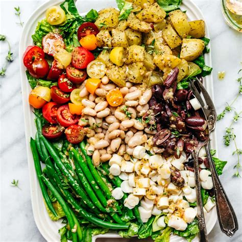 vegan-nicoise-salad-with-the-best-creamy-dressing image