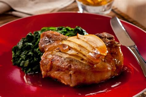 pork-chops-with-apple-onion-sage-12-tomatoes image