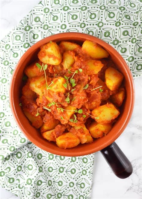 patate-rifatte-a-potato-side-dish-with-tomato-and image