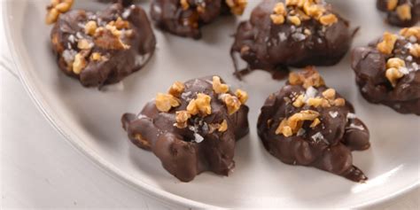 salted-caramel-walnut-chocolate-clusters-delish image