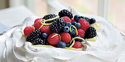 pavlova-with-lemon-cream-and-berries image