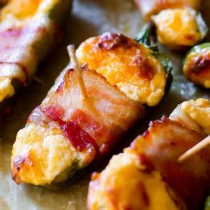 bacon-wrapped-cheesy-stuffed-jalapeos image