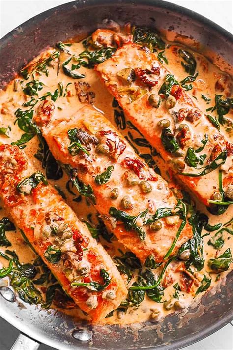 creamy-tuscan-salmon-with-spinach-artichokes-and-garlic image