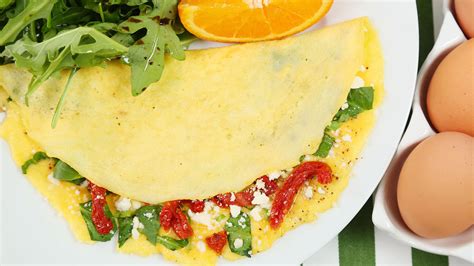 spinach-sundried-tomato-feta-omelette image