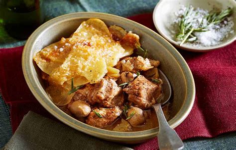 pork-apple-and-cider-stew-with-crispy-potatoes image