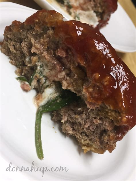 goat-cheese-and-spinach-stuffed-meatloaf image