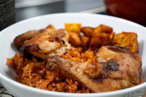 ghanaian-jollof-rice-with-chicken-recipe-by-essie image