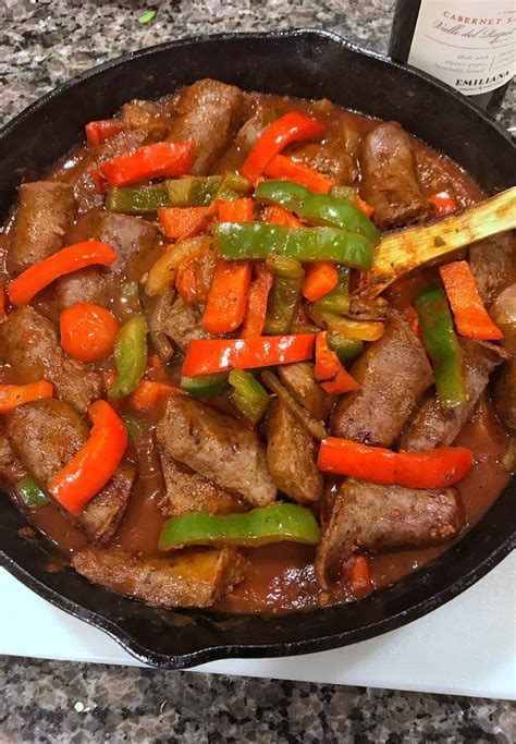 sausage-peppers-and-onions-in-a-red-wine-sauce image