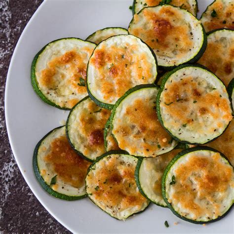 baked-parmesan-zucchini-rounds-bake-it-with-love image