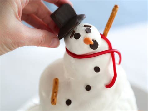 how-to-make-a-cheeky-melting-snowman-cake-food image