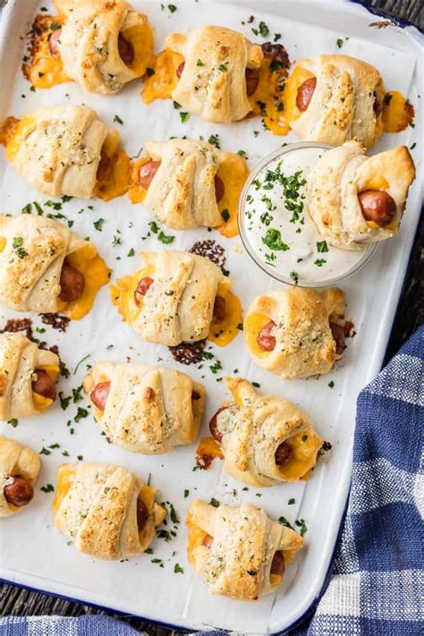 pigs-in-a-blanket-with-cheese-and-parmesan-ranch-butter image