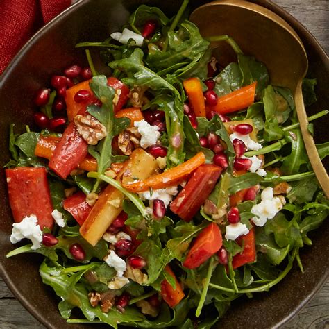 arugula-salad-with-carrots-and-goat-cheese-eatingwell image
