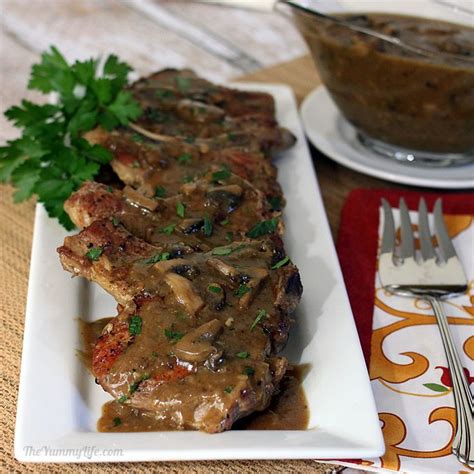 easy-skillet-pork-chops-smothered-in-mushroom-gravy image