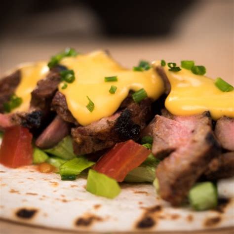spicy-steak-cheese-tacos-grilled image