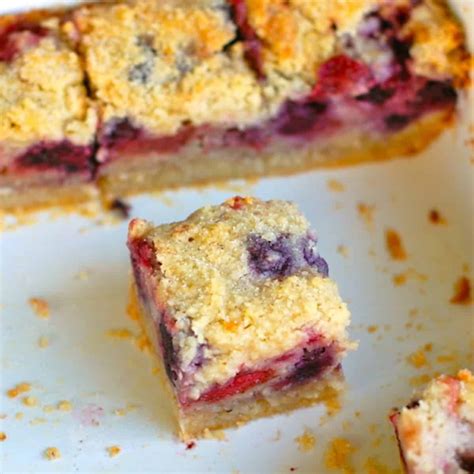 triple-berry-pie-bars-recipe-pinch-of-yum image