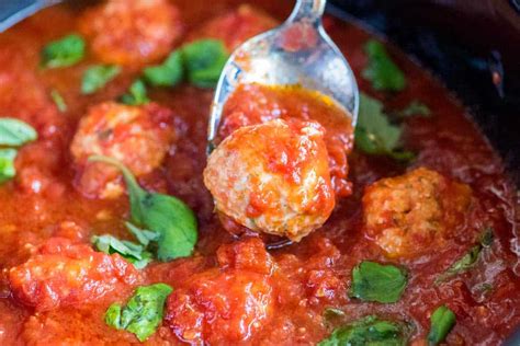 tomato-basil-slow-cooker-chicken-meatballs-inspired image