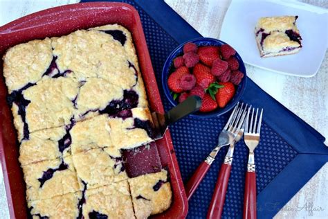 berry-coffee-cake-with-triple-berry-sauce-the-foodie-affair image