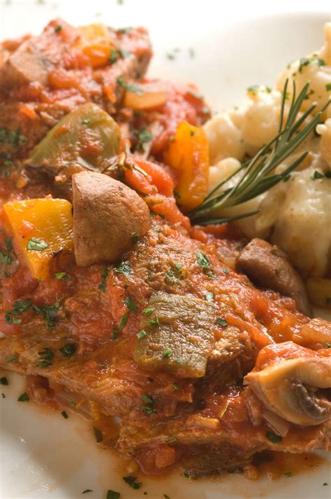 braised-veal-cacciatore-with-spicy-almond-and-goat image