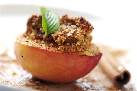 decadent-baked-peaches-with-almond-cookie-stuffing image
