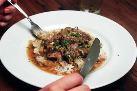 smothered-pork-roast-over-rice-the-amateur-gourmet image