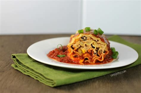 mexican-lasagna-roll-ups-emily-bites image