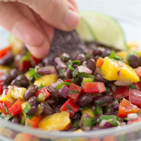 fresh-black-bean-and-mango-salsa-delish-knowledge image