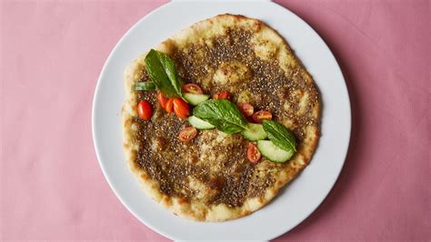 manoushe-with-zaatar-oil-tomatoes-and-cucumber image