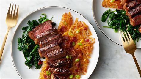 pan-seared-steak-and-loaded-hash-browns-for-two image
