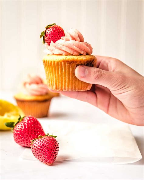 lemon-cupcakes-with-strawberry-frosting-kickass-baker image
