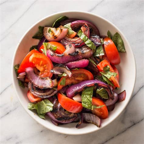 grilled-onion-and-tomato-salad-cooks-illustrated image