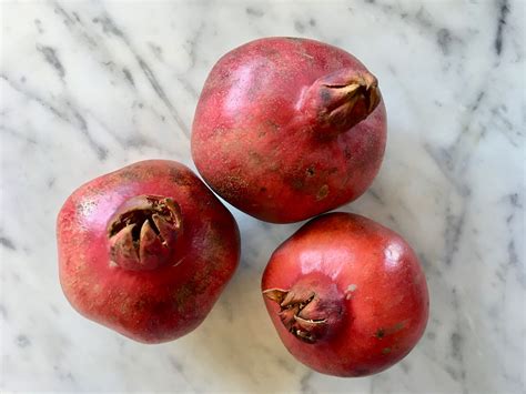 how-to-seed-and-eat-a-pomegranate-the-spruce-eats image