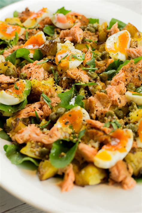 hot-smoked-salmon-salad-with-egg-smashed image
