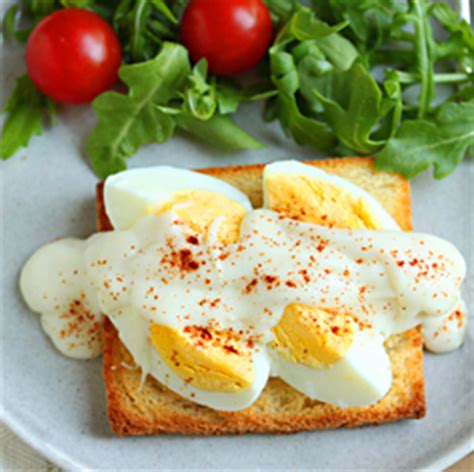 hard-cooked-eggs-on-toast-with-bchamel-sauce image
