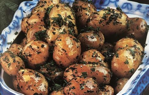 buttered-new-potatoes-with-parsley-mint-and-chives image