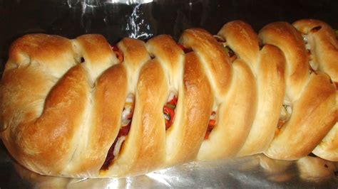 braided-italian-pizza-bread-loaf-recipe-farm-and-dairy image