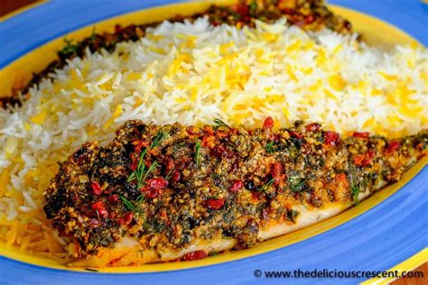 almond-crusted-fish-with-herbs-the-delicious-crescent image