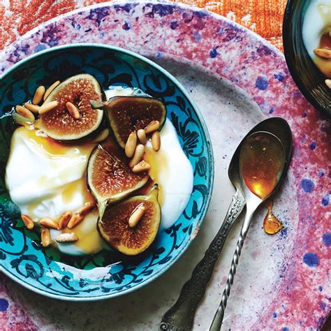 yogurt-with-fresh-figs-honey-and-pine-nuts image