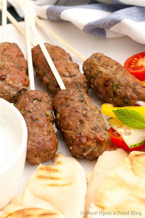 lamb-koftas-with-herb-yoghurt-and-griddled-once image