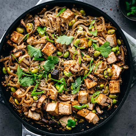 vegan-rice-noodles-with-crispy-tofu-and-mushrooms image