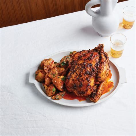 chile-and-citrus-rubbed-chicken-with-potatoes image