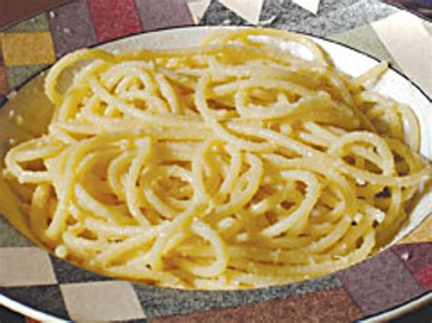 pasta-al-burro-e-parmigiano-on-the-table-north image