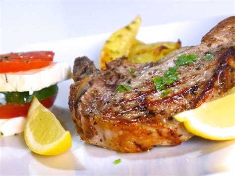greek-pork-chops-recipe-with-roast-potatoes-brizola-sto image