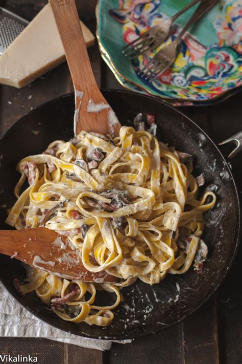 creamy-tagliatelle-with-bacon-mushrooms-and-truffle image