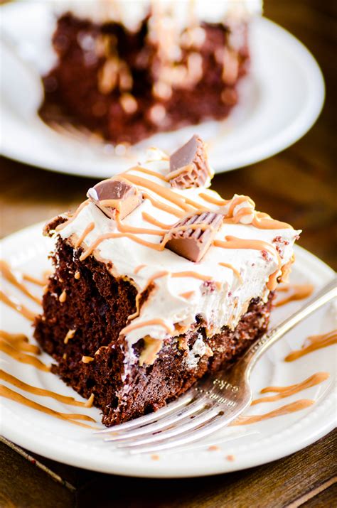 peanut-butter-cup-poke-cake-recipe-something-swanky image