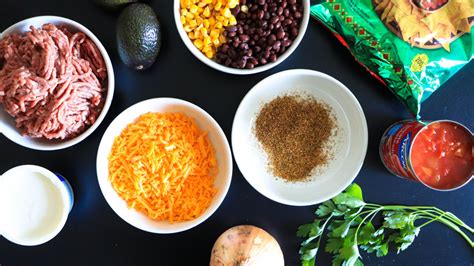 easy-cheesy-taco-bake-recipe-tasting-table image
