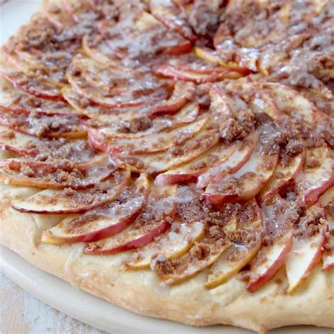 apple-dessert-pizza-with-cinnamon-streusel-topping image