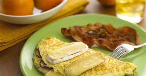 smoked-brie-wedge-bacon-mushroom-omelet image